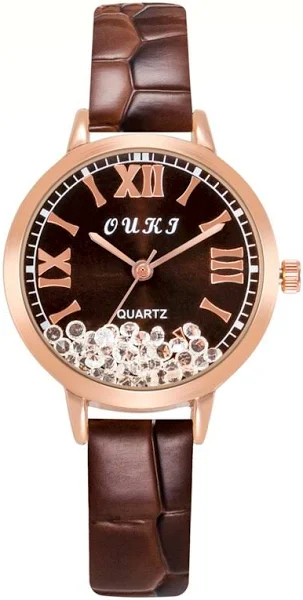 Damski zegarek z ozdobnymi kryształkami na tarczy