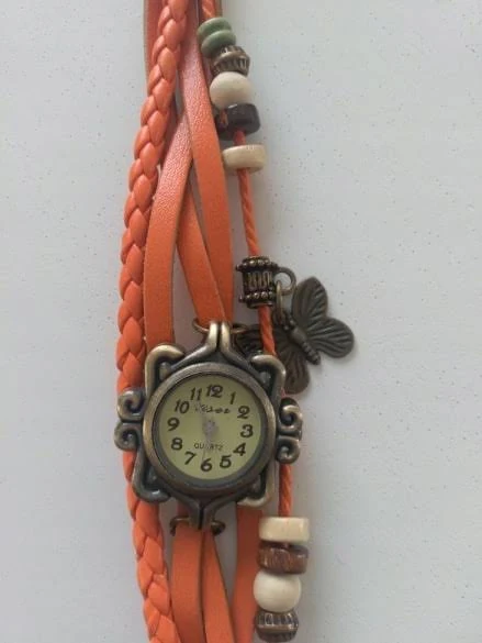 Zegarek na rękę retro pomarańczowy ozdobny pasek